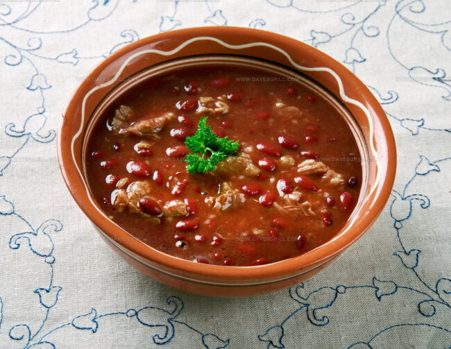What Are the Essential Spices and Herbs Used in Western European Bean Recipes?