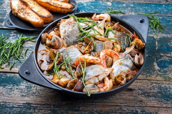 How Is Spanish Fish Cuisine Mostly Cooked - Grilled, Stewed, or Fried?
